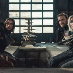 Still from Thunderbolts showing the team in a tense moment, capturing the film’s emotional depth and vulnerability."