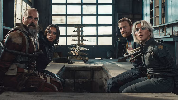 Still from Thunderbolts showing the team in a tense moment, capturing the film’s emotional depth and vulnerability."